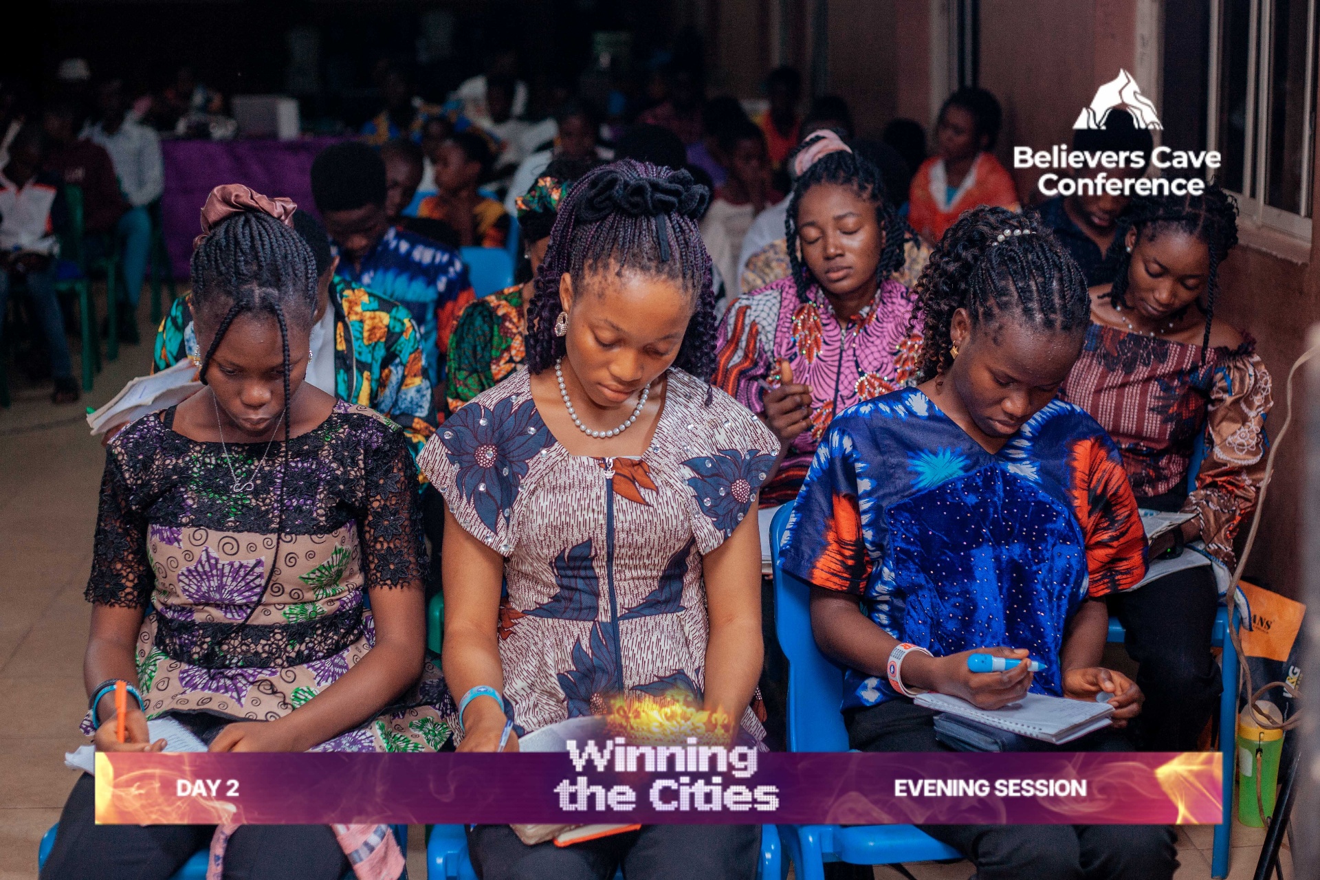 Sisters in prayer during evening session